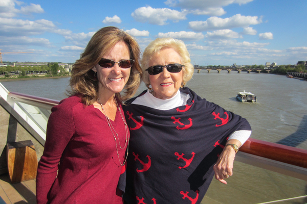 Mother and daughter in front of lake